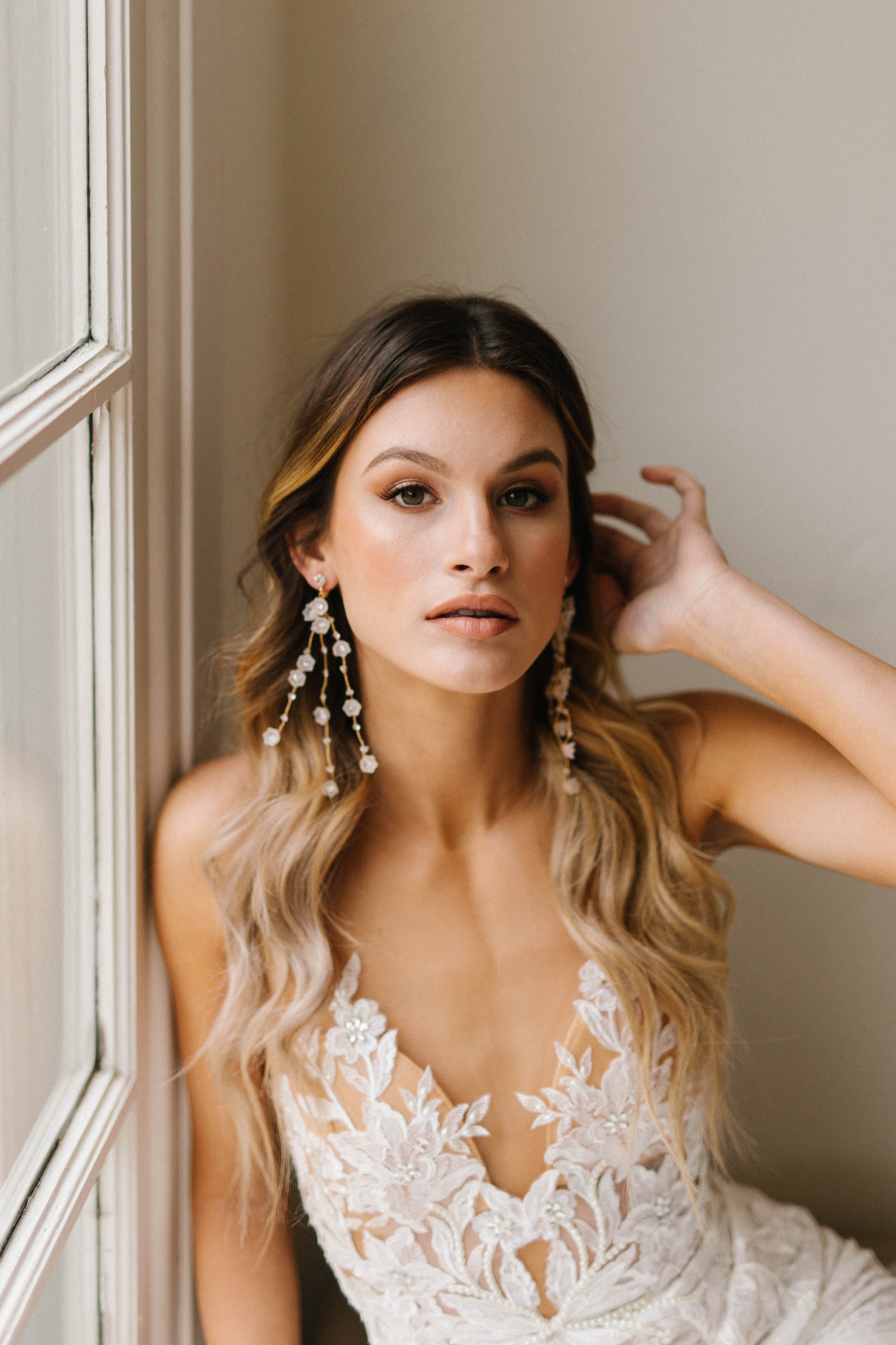 Bridal jewelry styled with a seaside dress