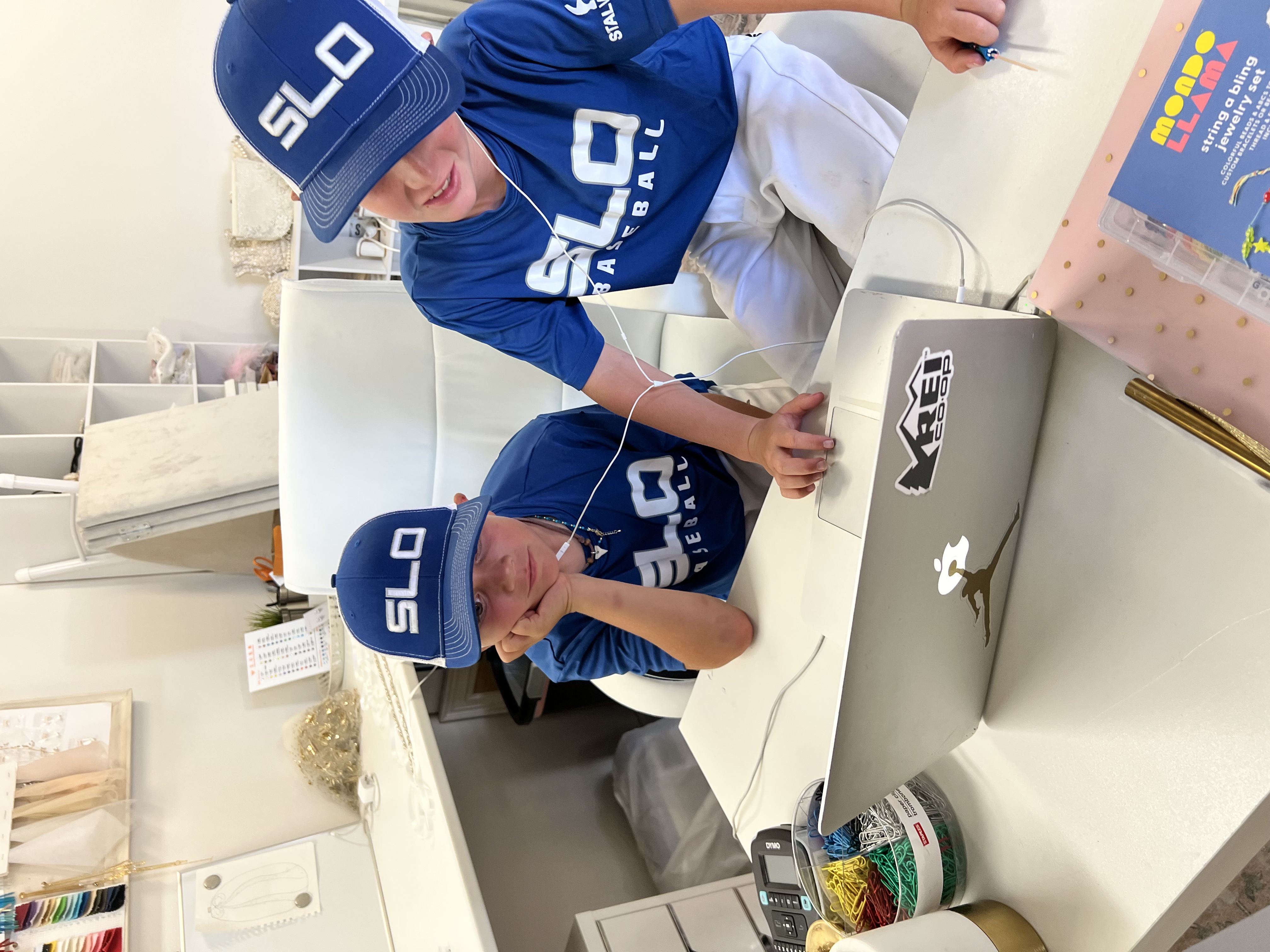 Young athletes organizing team gear and business supplies