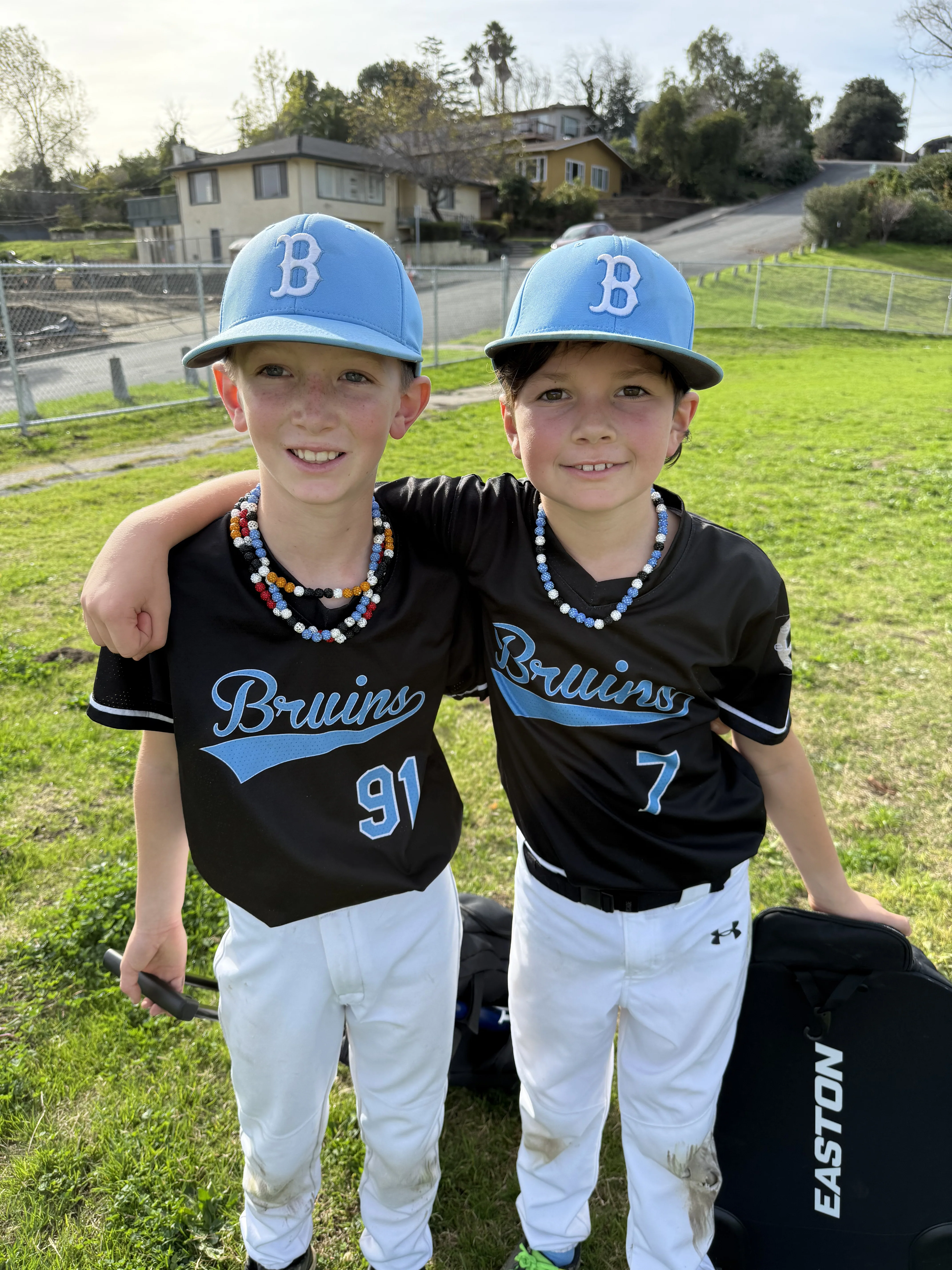 Young athlete wearing a sports necklace
