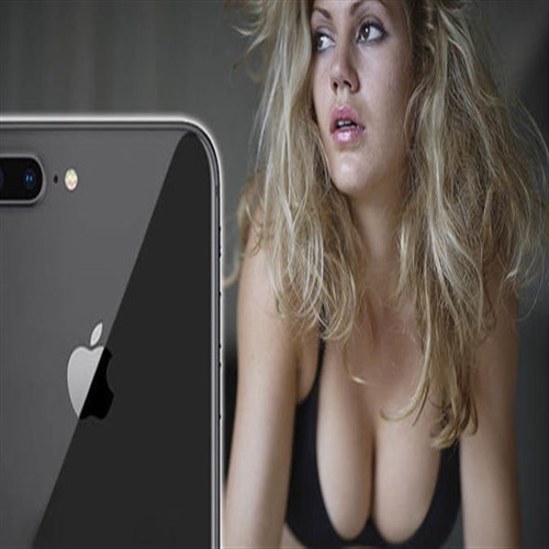 A woman in a black bra next to a dark iPhone with an Apple logo.