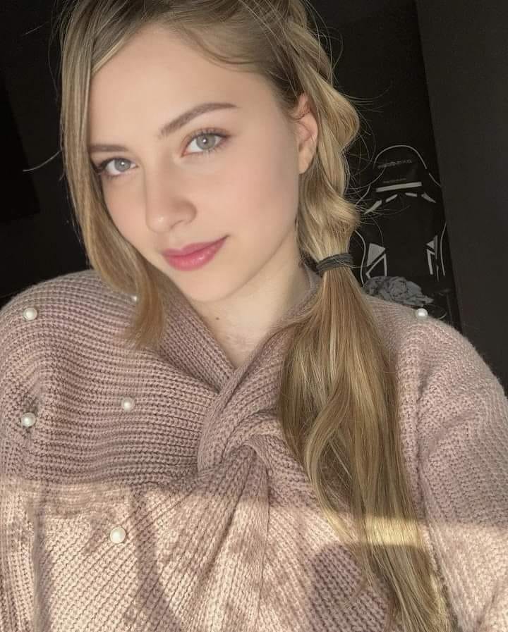 Dallas skyline with silhouettes of people mingling.