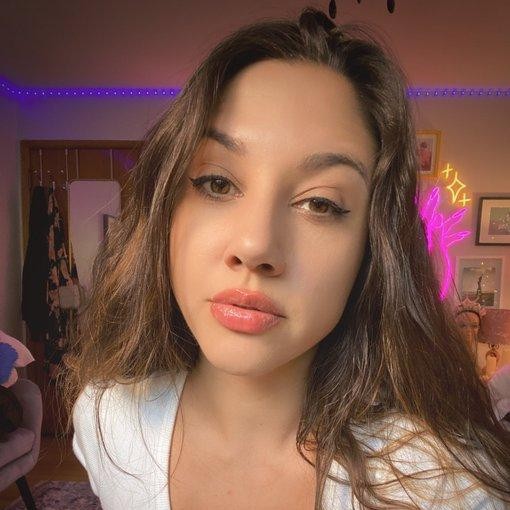 San Jose cityscape at night with people meeting.