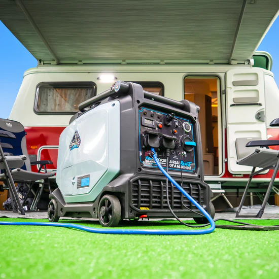 Portable GP3800iE inverter generator on paved ground.