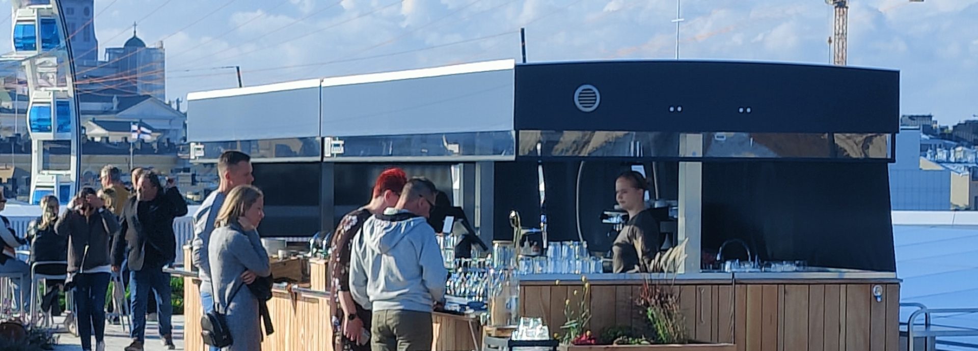 Sleek mobile food bar in a food service setting.