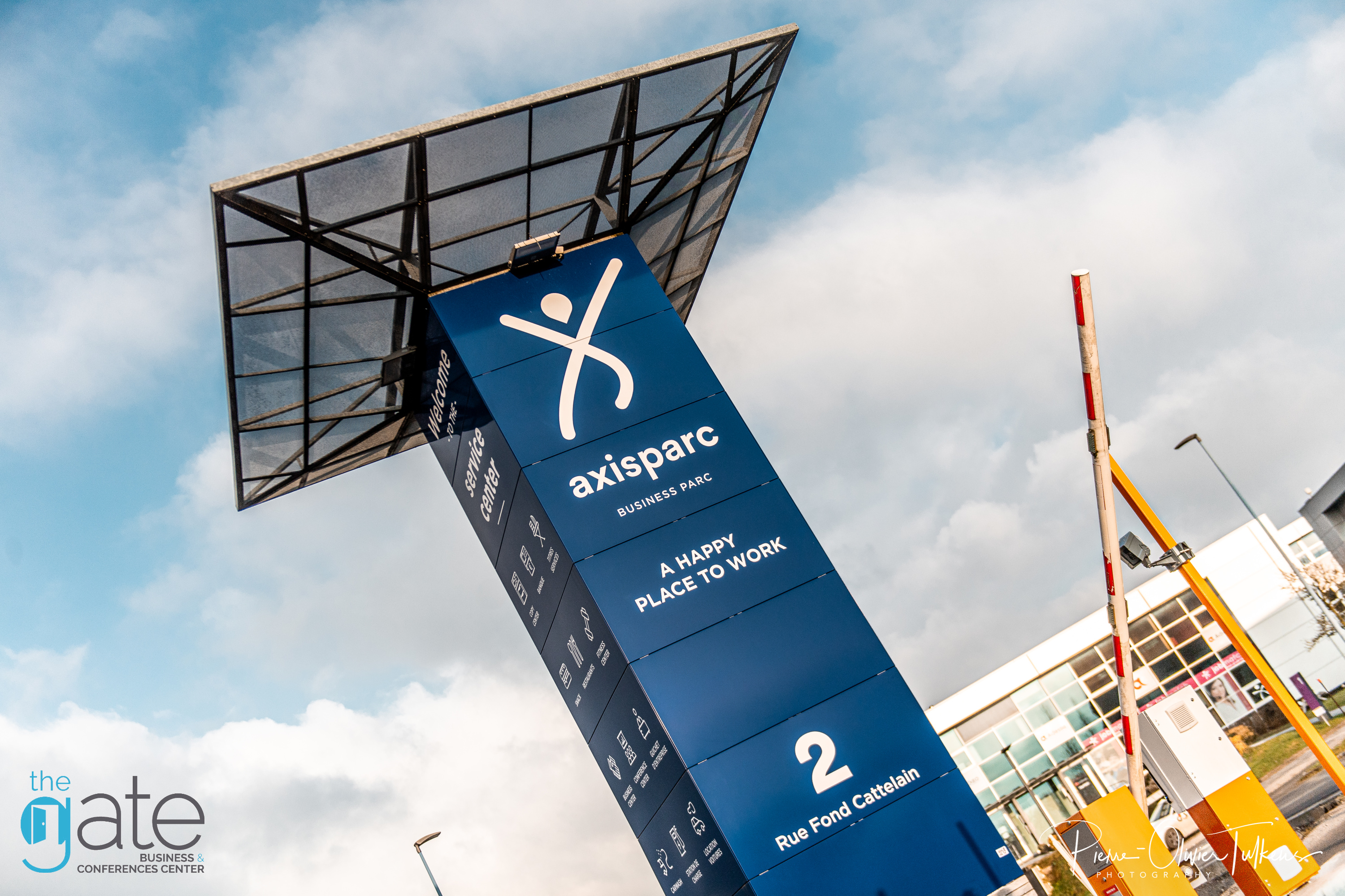 Sign for Axisparc, a business and conference center.