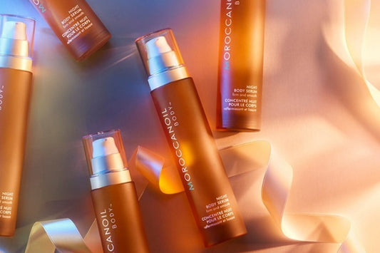 Amber-toned haircare bottles arranged together