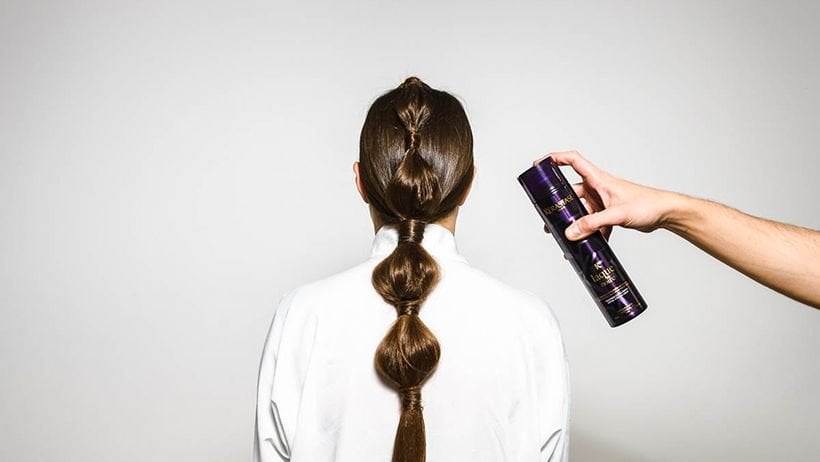 Applying hair serum through damp lengths