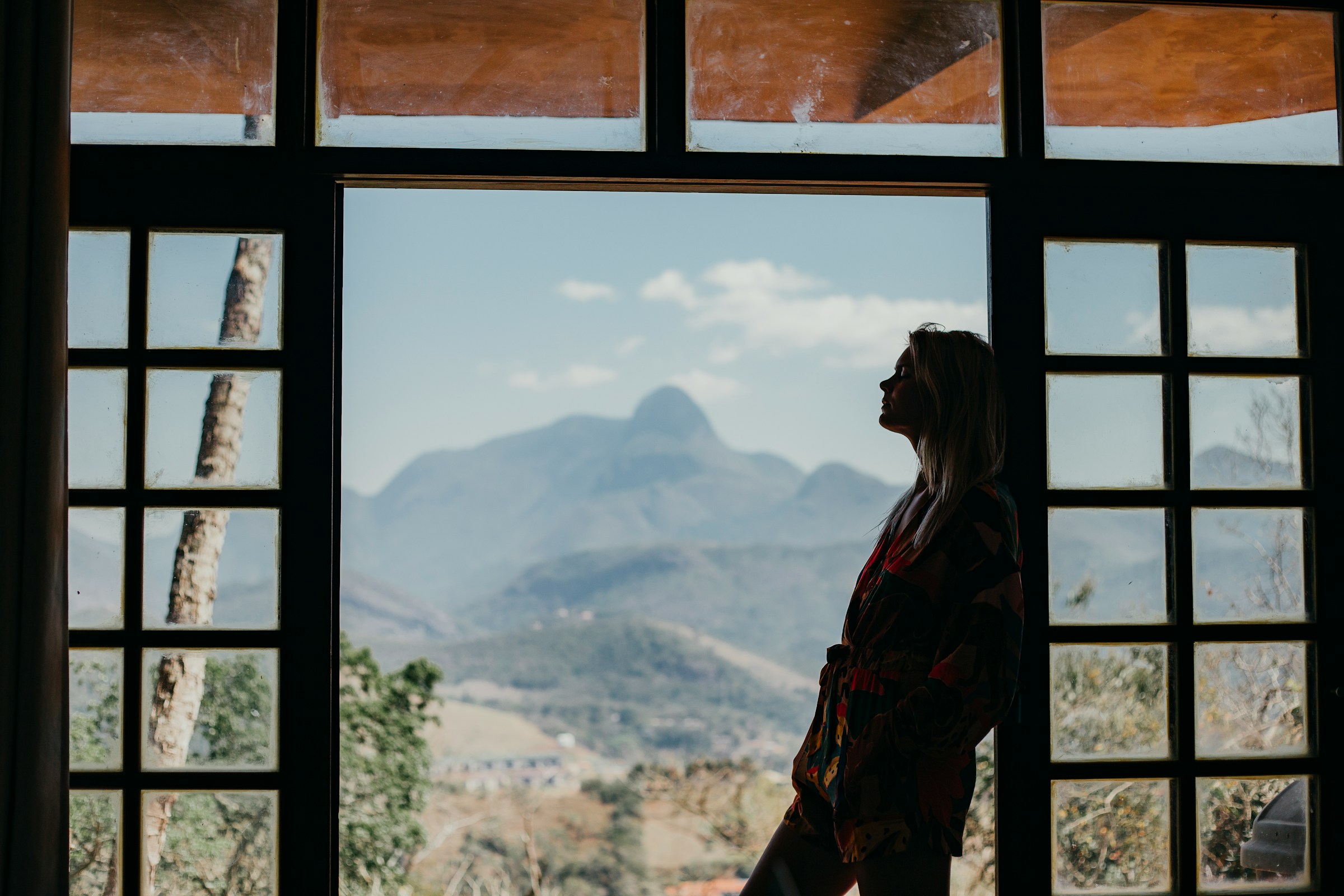 Woman Standing in Home - Inpatient vs. Outpatient Rehab