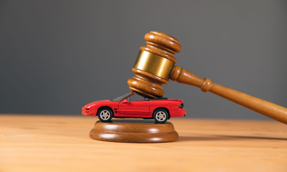 car under a hammer - Voluntary Repossession in Texas